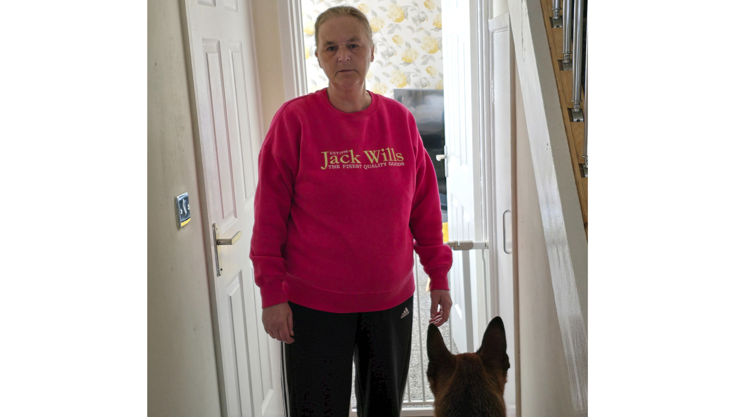 Koreena at home, with her dog