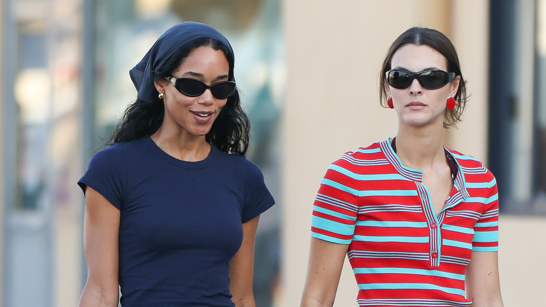 Laura Herrier and Vittoria Ceretti wearing casual pencil skirt outfits in Saint-Tropez