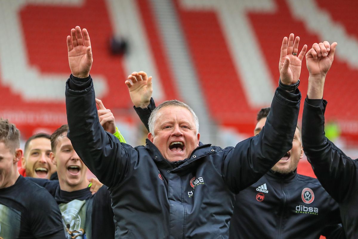 Sheffield United manager Chris Wilder celebrates with his players after winning promotion to the Premier League, 2019