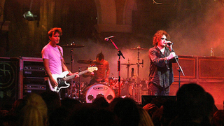 Robert Smith of The Cure performs on stage with Blink-182 at "MTV Icon of 2004 - The Cure" at Old Billingsgate Market on September 17, 2004 in London.