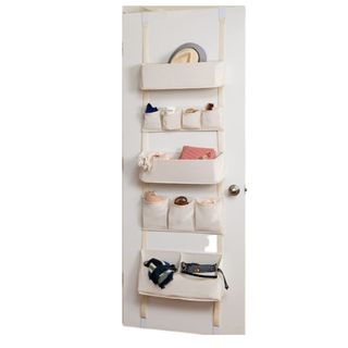 A beige hanging organizer on a door