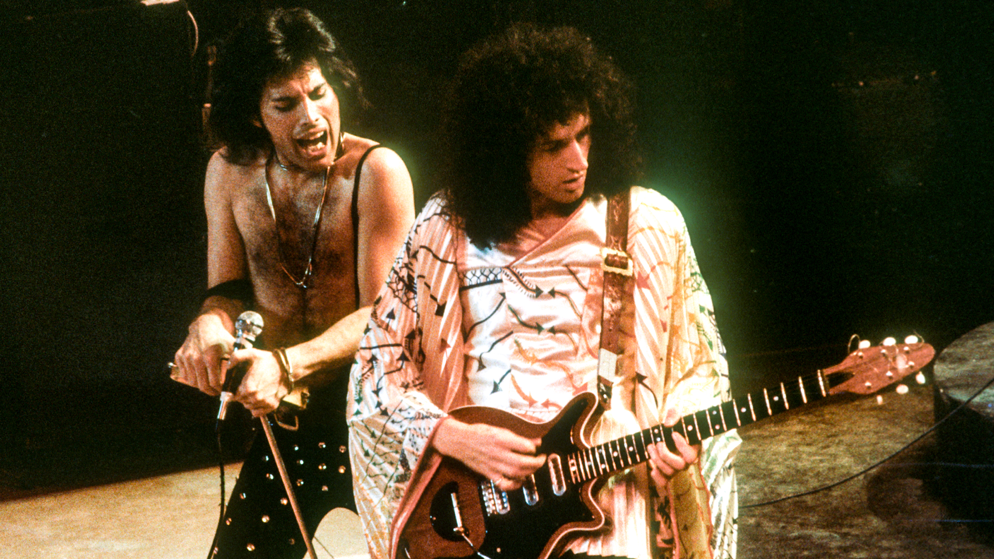 Freddie Mercury and Brian May perform with Queen circa 1976