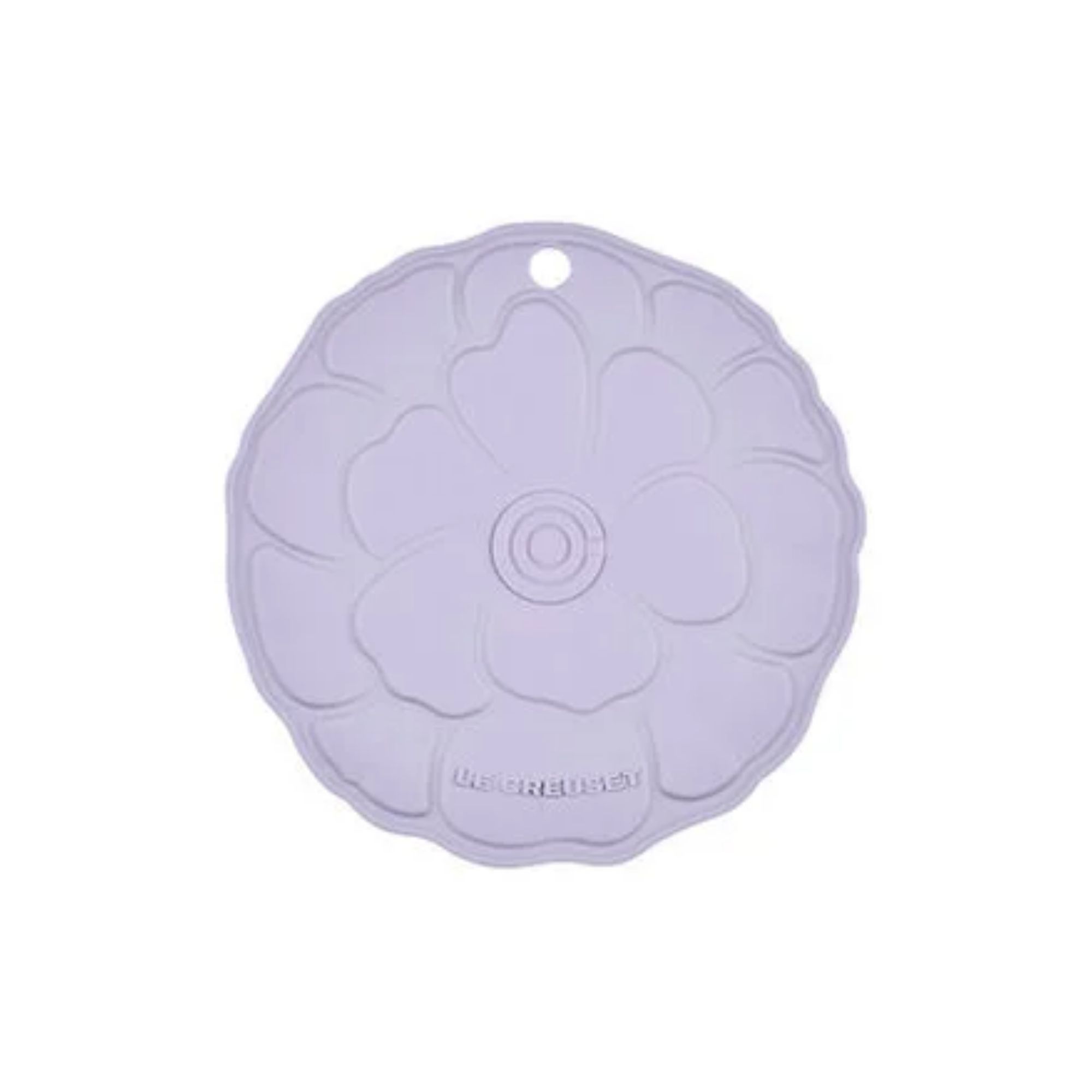 A purple rubber trivet with a flower design embossed on it