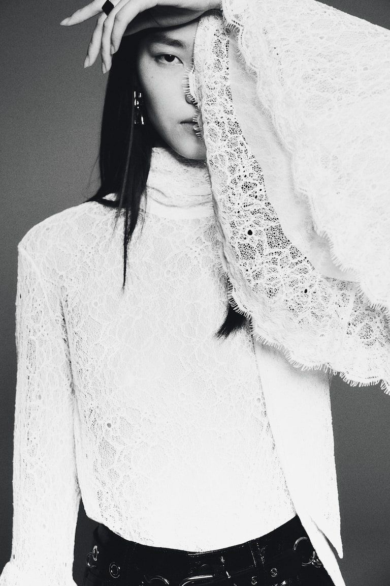 Trumpet-Sleeved Lace Blouse