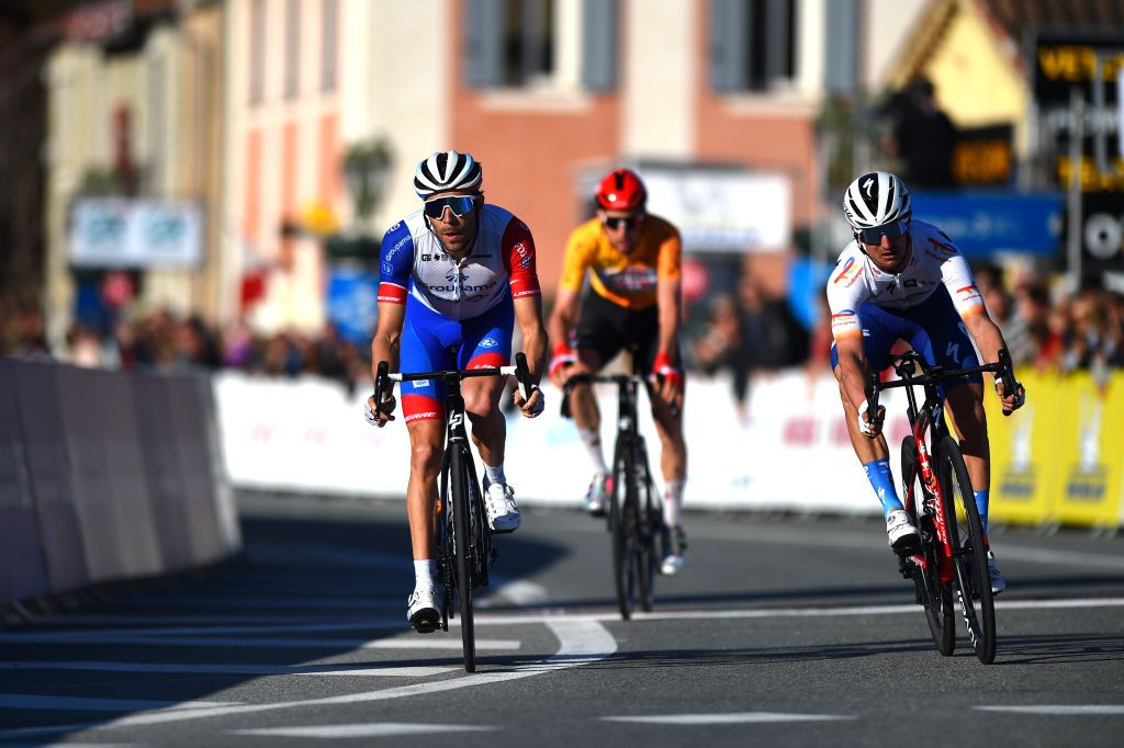 BLAUSASC FRANCE FEBRUARY 20 Tim Wellens of Belgium and Team Lotto Soudal Yellow Leader Jersey Thibaut Pinot of France and Team Groupama FDJ and Alexis Vuillermoz of France and Team Total Energies sprint at finish line during the 54th Tour Des Alpes Maritimes Et Du Var Stage 3 a 1126km stage from Villefranche sur Mer to Blausasc on February 20 2022 in Blausasc France Photo by Dario BelingheriGetty Images