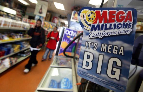 A sign advertising Mega Millions.