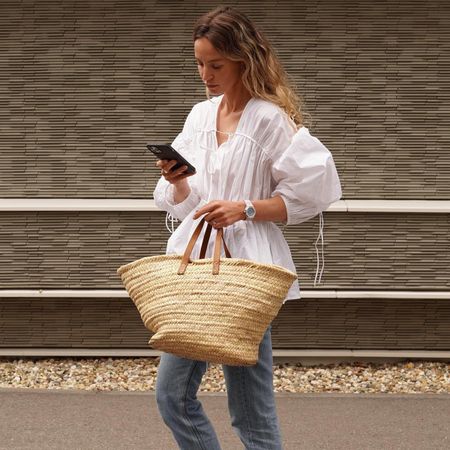 Influencer styles flat mule shoes.