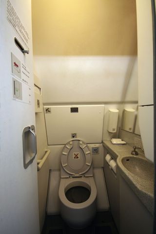 An airplane toilet.