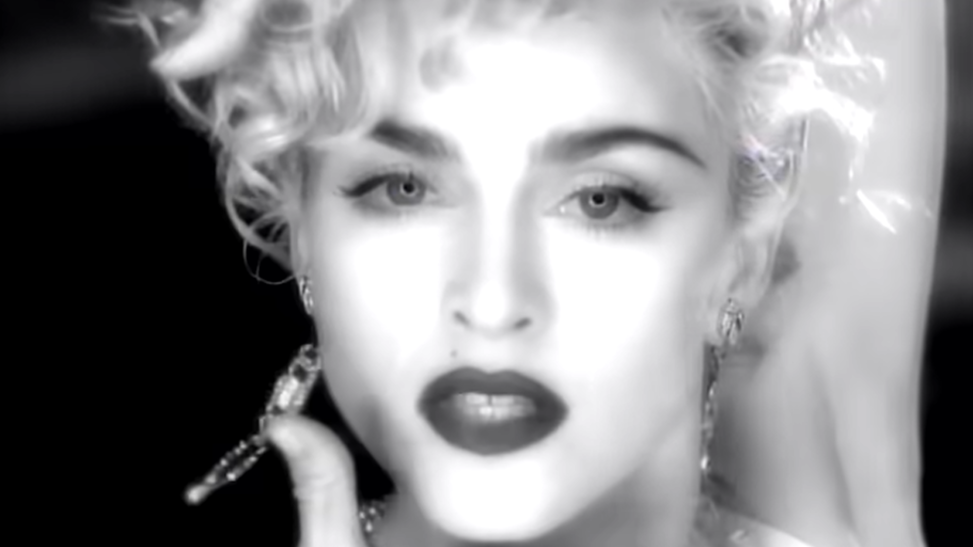 Madonna strikes a pose in her music video Vogue