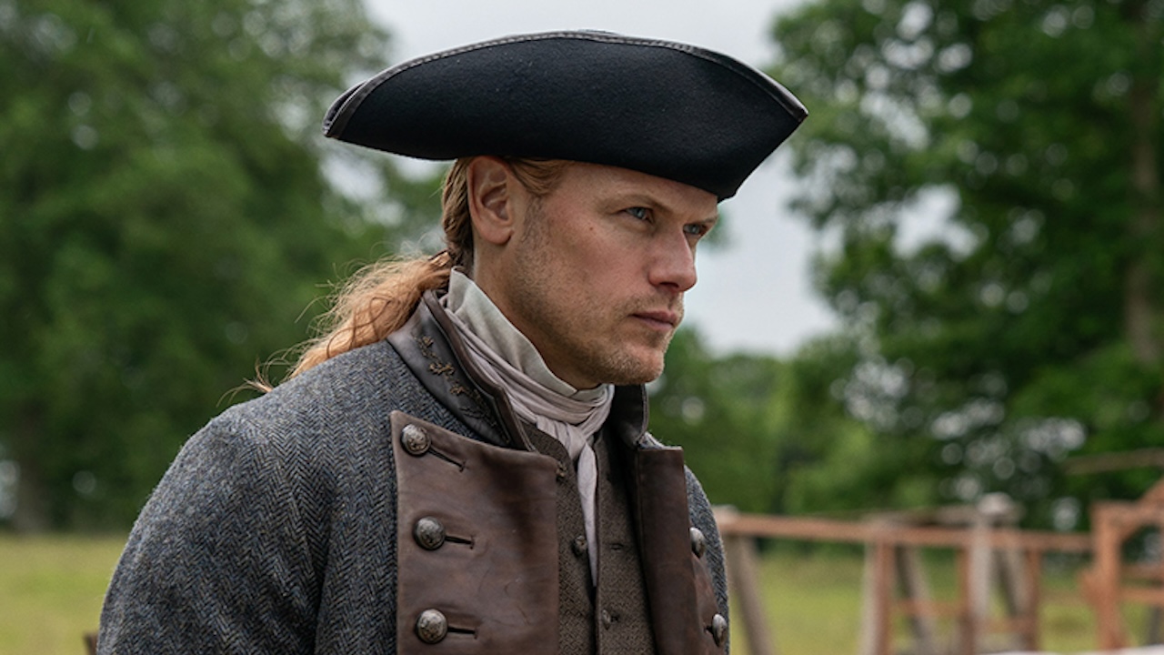 Sam Heughan playing Jamie Fraser pictured behind the scenes of Outlander Season 8