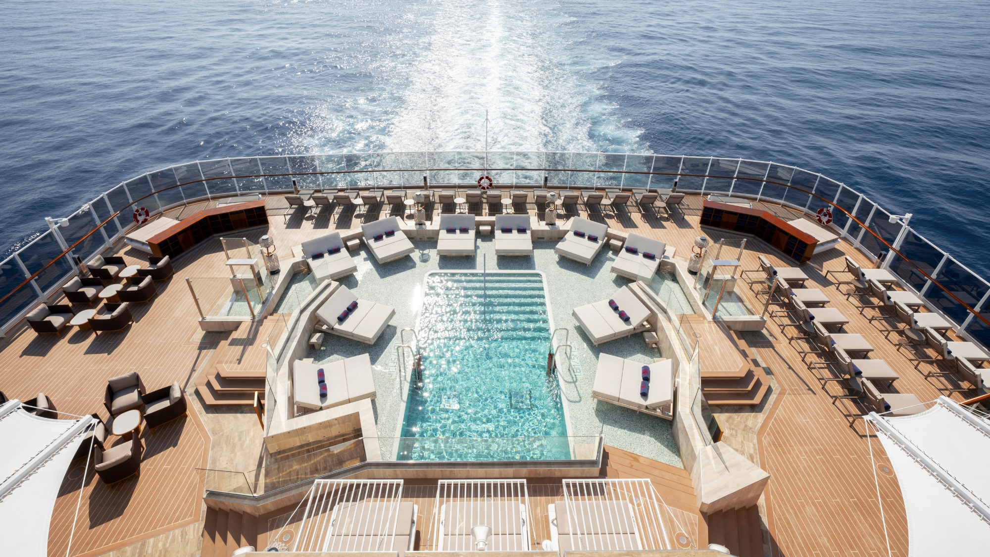 The deck and swimming pool onboard Explora II cruise ship.