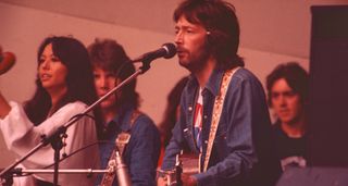 [above, from left] Yvonne Elliman, Terry and Clapton on stage in the U.K., July 31, 1976