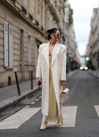 French street style - woman wearing an all white outfit