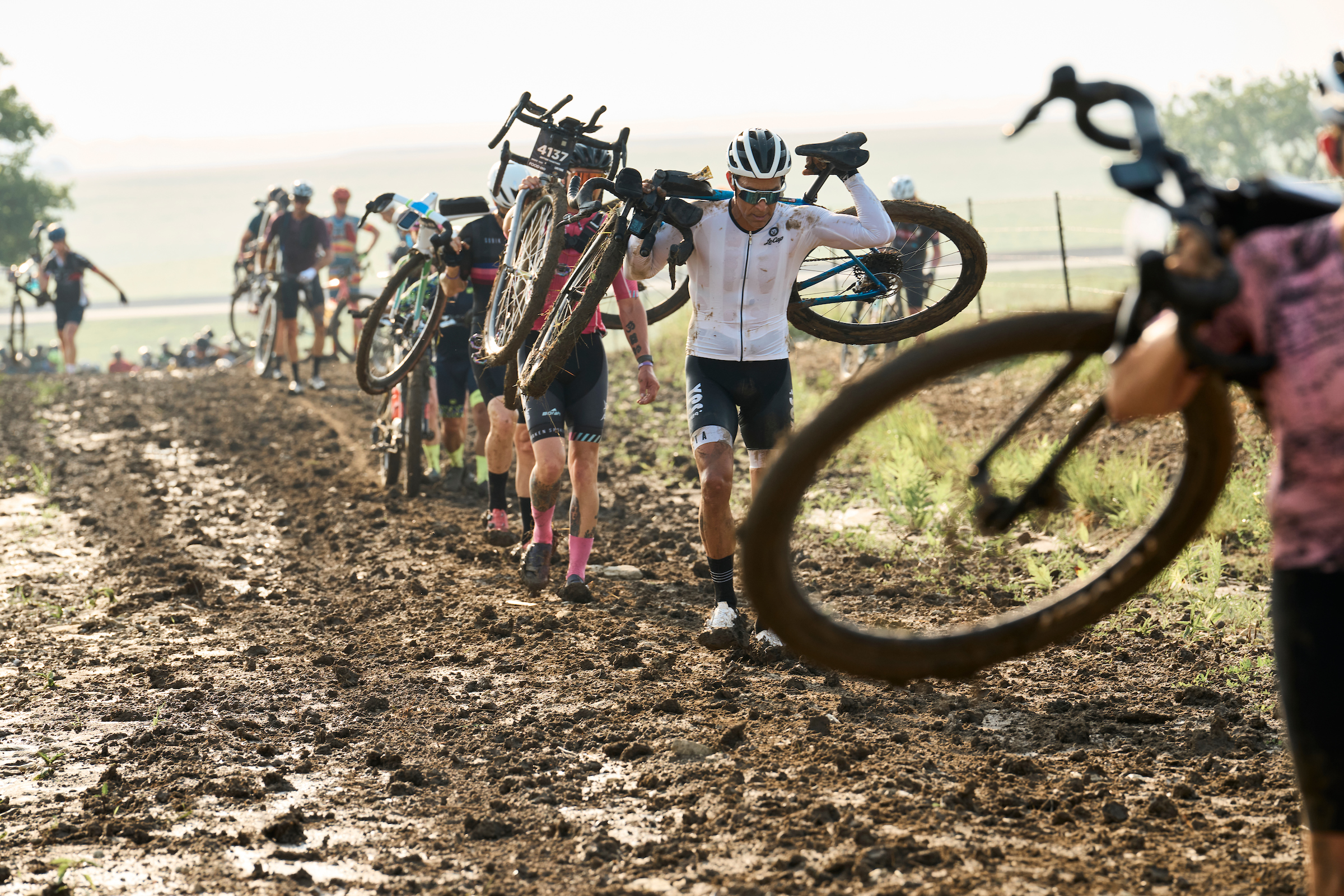 Amateurs battled mud starting at mile 10 for both Unbound Gravel 100 and 200 races                 