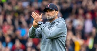 Liverpool manager Jurgen Klopp applauds the home fans during the Premier League match between Liverpool FC and Nottingham Forest at Anfield on April 22, 2023 in Liverpool, United Kingdom.