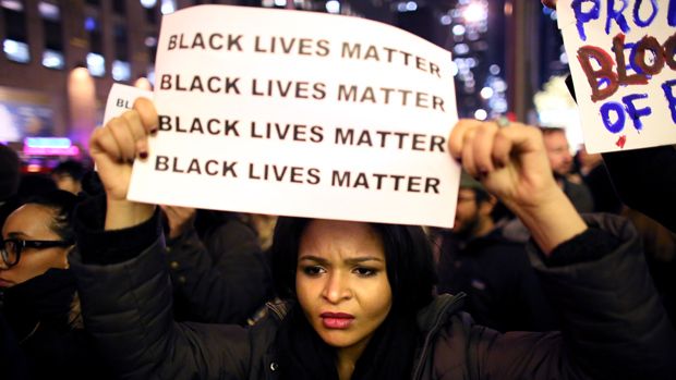 NEW YORK - DECEMBER 3: Demonstrators walk together during a protest December 3, 2014 in New York. Protests began after a Grand Jury decided to not indict officer Daniel Pantaleo. Eric Garner 