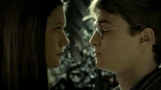 Bonnie Wright and Daniel Radcliffe kiss in Harry Potter and the Half-Blood Prince.
