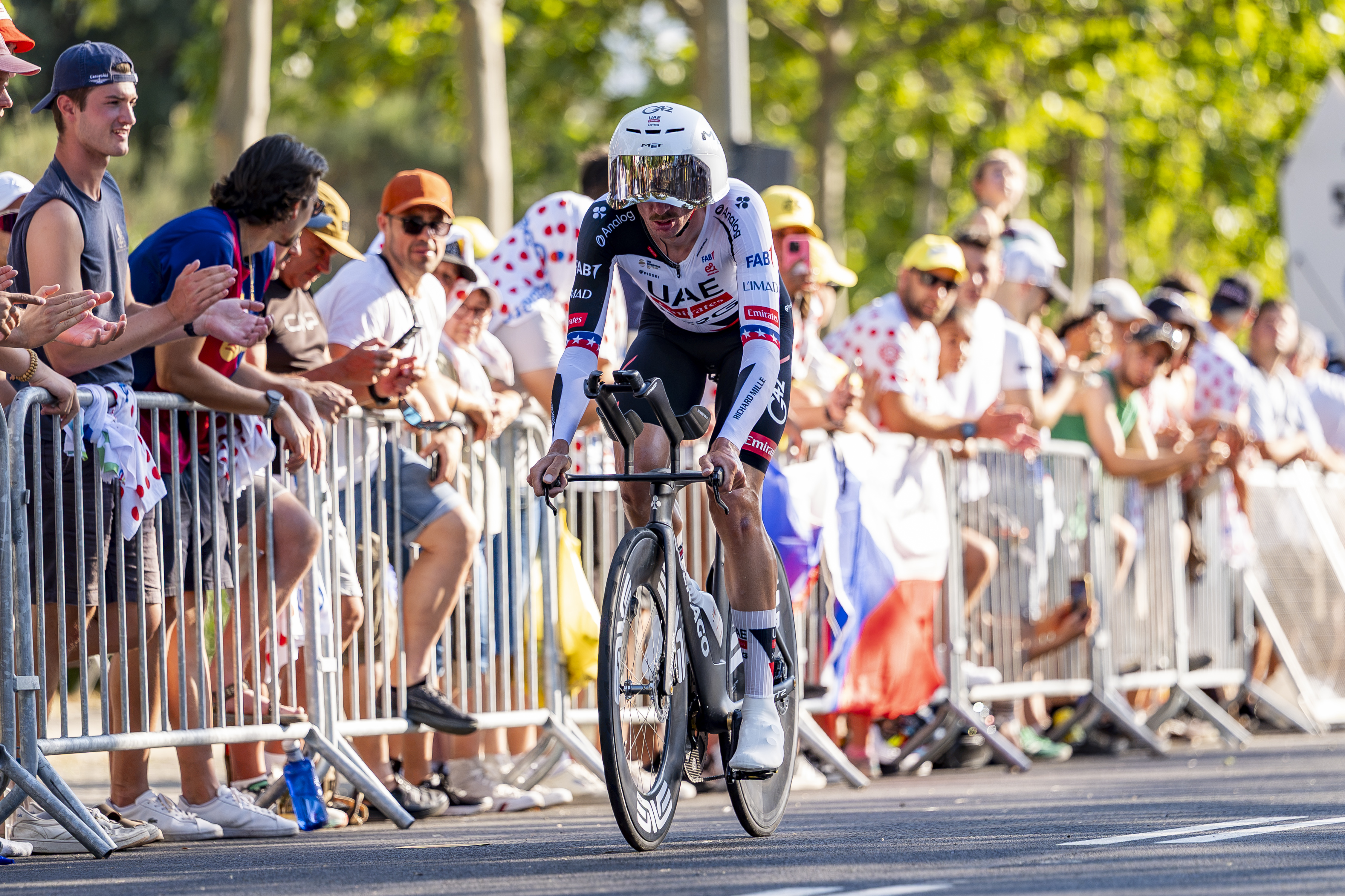 US rider Brandon McNulty knocked off bike by car driver before Tour de France time trial on stage 16
