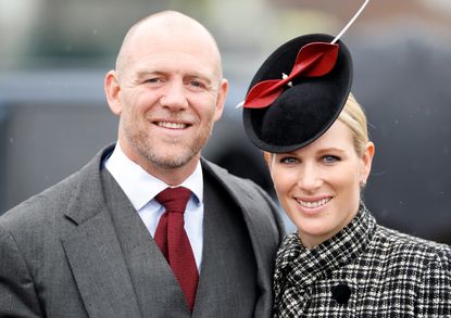 Zara and Mike Tindall pose at Cheltenham Festival 2019