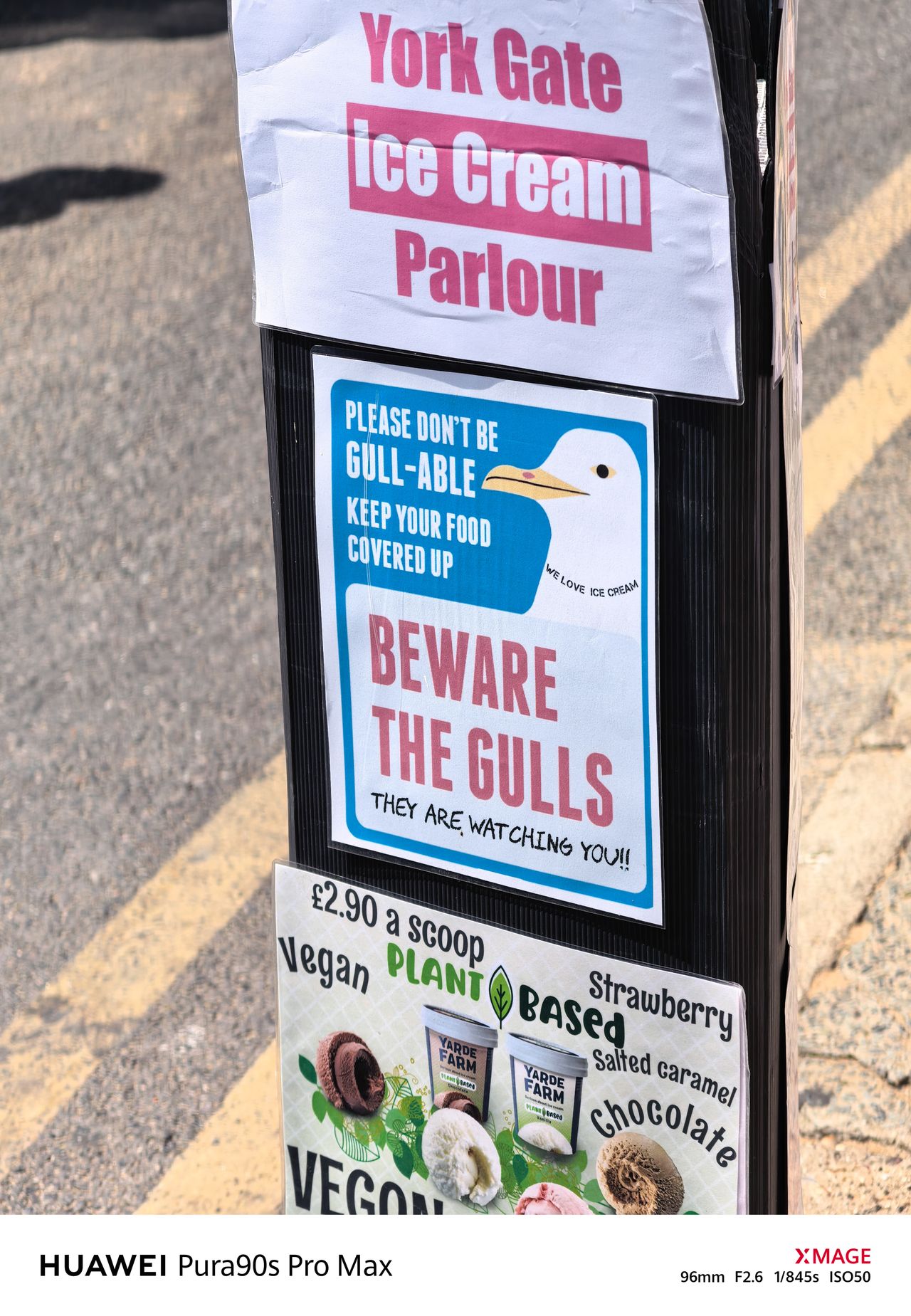 Signs outside York Gate Ice Cream Parlour, including a warning to keep food covered from seagulls.
