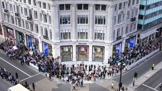 A line of people outside the Microsoft Experience Centre in London