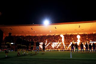 General view as Ruben Neves of Wolverhampton Wanderers leads the team out onto the pitch ahead of the Carabao Cup Third Round match between Wolverhampton Wanderers and Tottenham Hotspur at Molineux on September 22, 2021 in Wolverhampton, England.