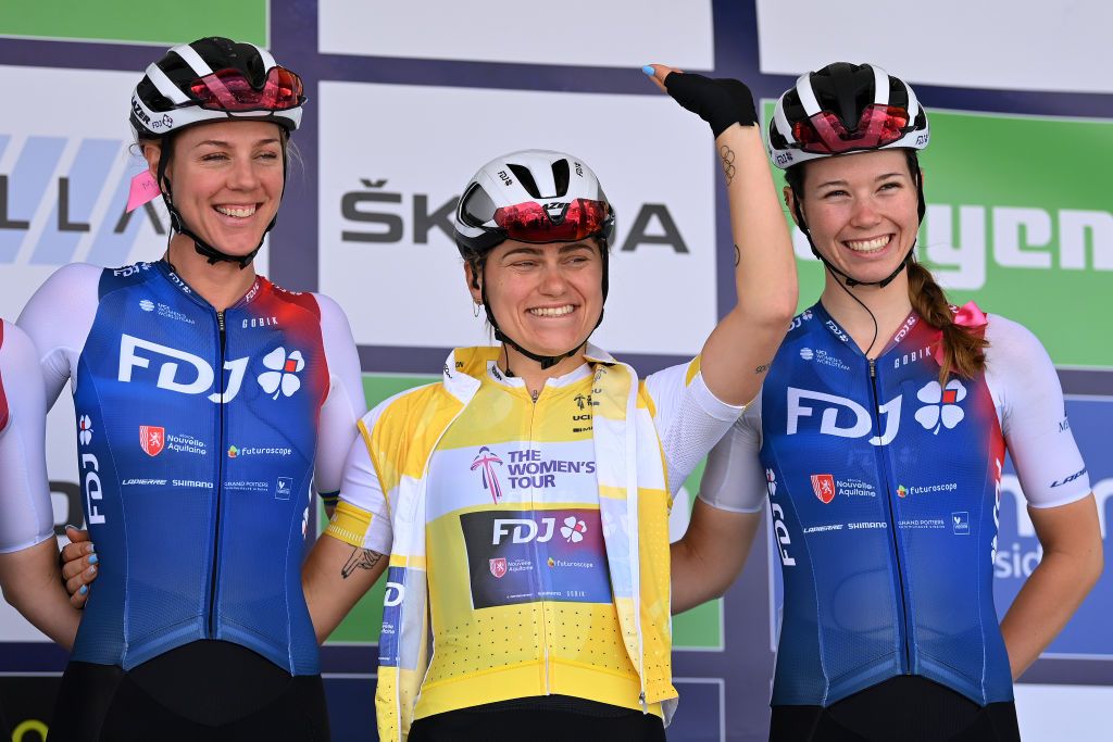 HARLOW ENGLAND JUNE 07 Clara Copponi of France and Team FDJ Nouvelle Aquitaine Futuroscope yellow leader jersey C with teammates during the team presentation prior to the 8th The Womens Tour 2022 Stage 2 a 921km stage from Harlow to Harlow WomensTour UCIWWT on June 07 2022 in Harlow England Photo by Justin SetterfieldGetty Images