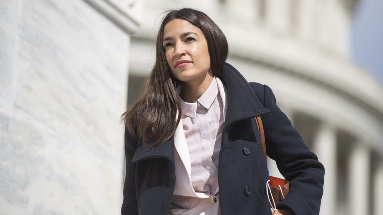 Rep. Alexandria Ocasio-Cortez, D-N.Y., is seen on the House steps of the Capitol before the House passed a $2 trillion coronavirus aid package by voice vote on Friday, March 27, 2020.