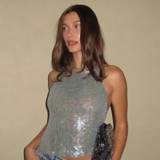 Hailey Bieber's 29th birthday outfit featuring a sequin top and Levi's 501 jeans.