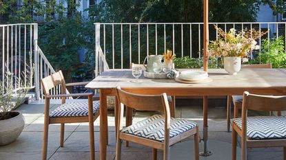 a teak outdoor dining table