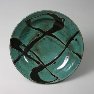 Jade plate with calligraphy-like motif