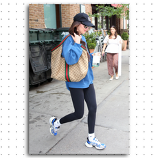 Dakota Johnson wearing blue sneakers 