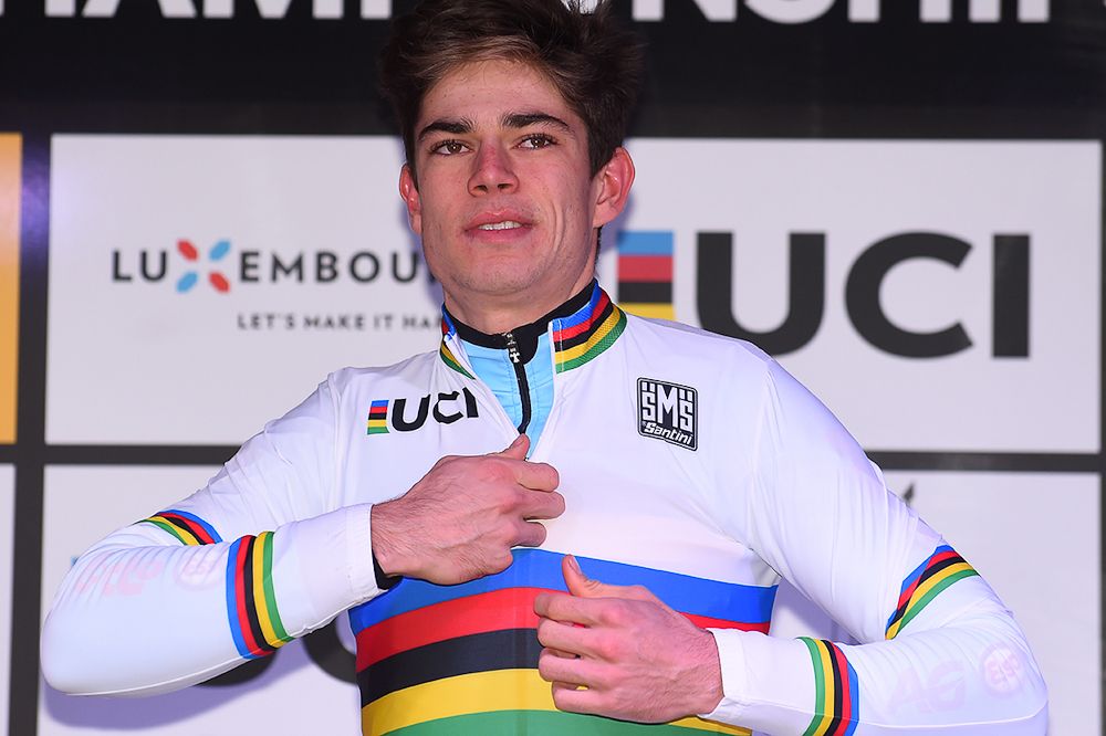 Wout Van Aert in the rainbow stripes.