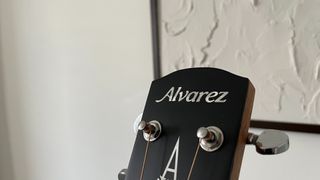 Close up of Alvarez AD30 headstock and logo