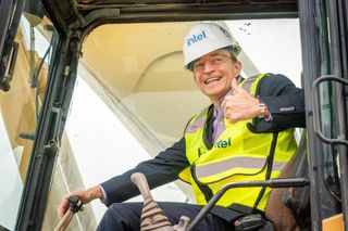 Intel CEO Pat Gelsinger poses in earth-moving equipment in Arizona