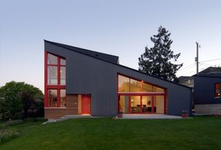 An exterior in dark grey and red