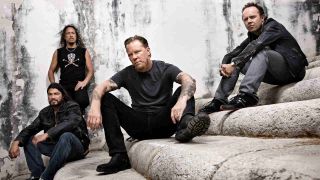 Metallica posing for a photograph in 2013