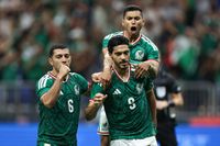 SAN ANTONIO, TEXAS - NOVEMBER 18: Raul Jimenez #9 of Mexico celebrates with his teammates after scoring a penalti during an international friendly match between Mexico and Paraguay at Alamodome on November 18, 2025 in San Antonio, Texas. (Photo by Omar Vega/Getty Images)