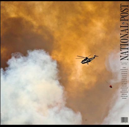 The National Post front page displays the massive fire.
