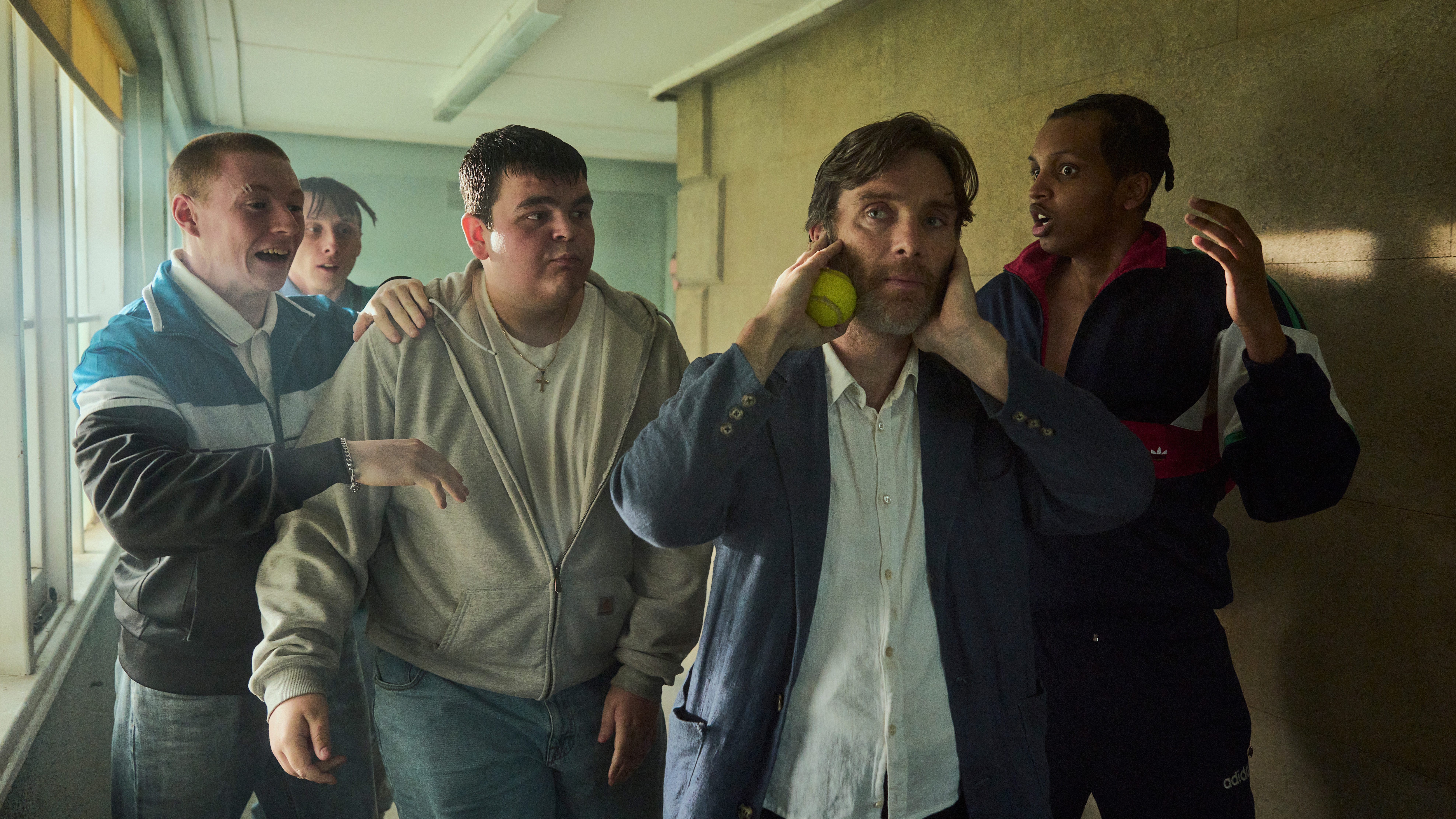 Cillian Murphy as Steve in Steve, surrounded by jeering students.