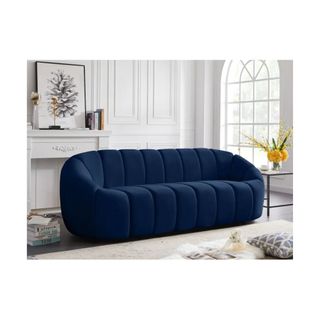 blue velvet sofa in living room