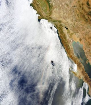 A wider view of the glory over the Pacific, west of Mexico's Baja peninsula, taken by NASA's Aqua satellite on June 20, 2012.