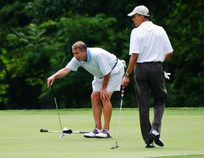 John Boehner golfs with then-President Obama