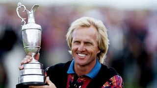 Greg Norman of Australia holds the Claret Jug after his victory during the final round of the 122nd Open Championship at Royal St Georges Golf Club