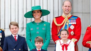 Prince George of Wales, Catherine, Princess of Wales , Prince Louis of Wales, Princess Charlotte of Wales and Prince William, Prince of Wales watch an RAF flypast