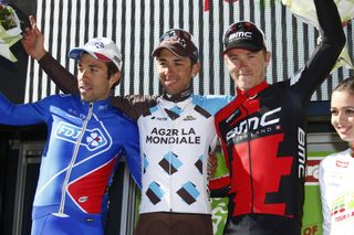 Pinot, Montaguti and Dennis on the stage podium