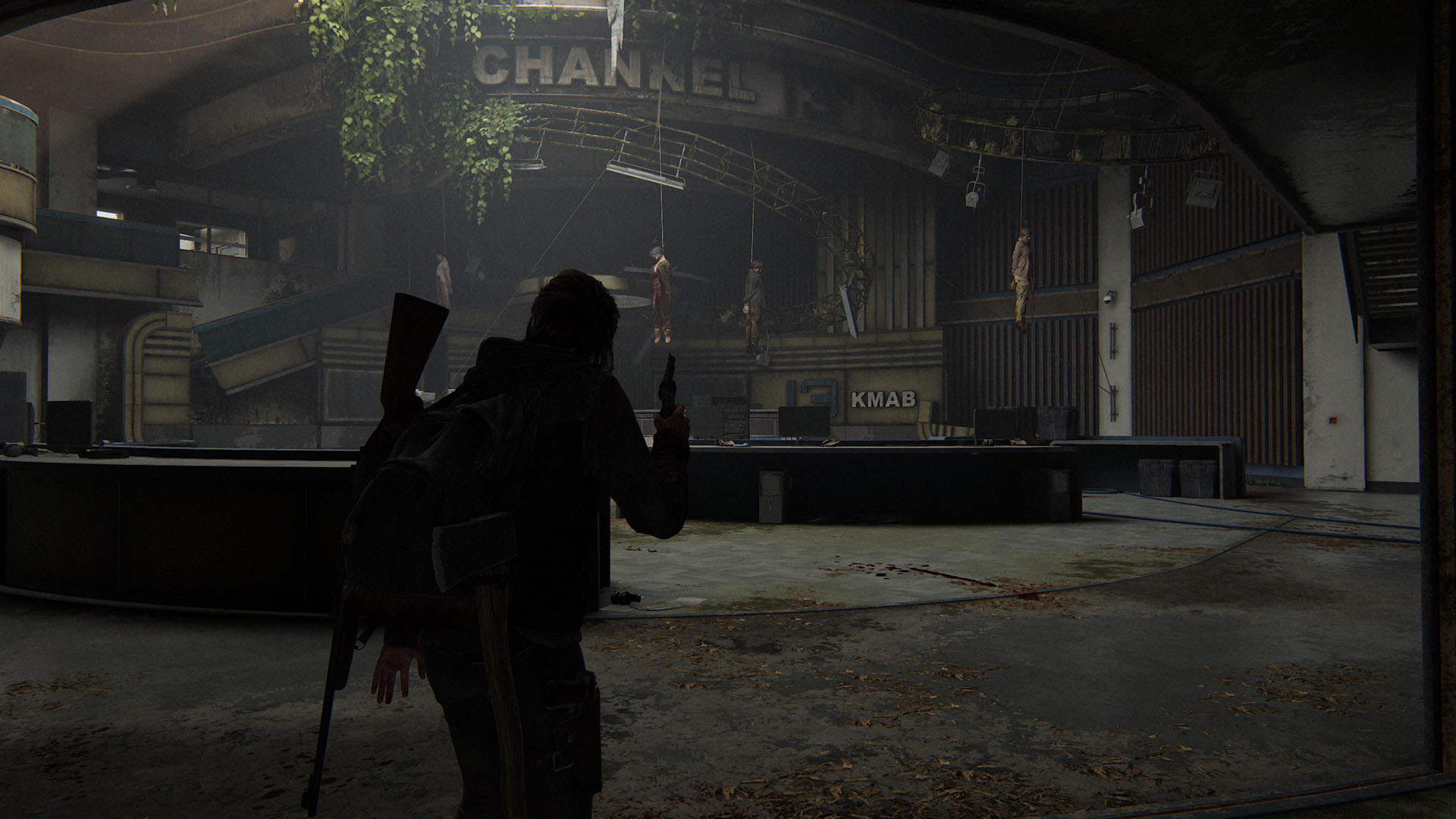 Ellie enters the abandoned news station in The Last of us Part 2 to discover WLF soldiers hanging from the ceiling