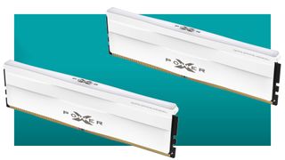 Two of Silicon Power's 16 GB XPower Zenith RAM in white float in the teal gradient PC Gamer deal void.