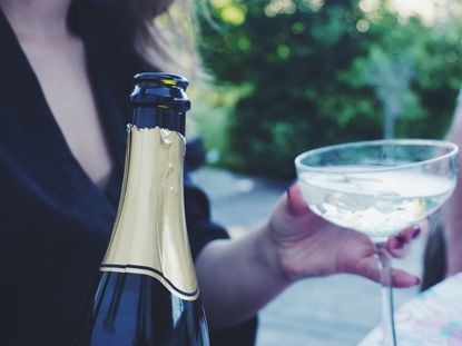 woman drinking prosecco