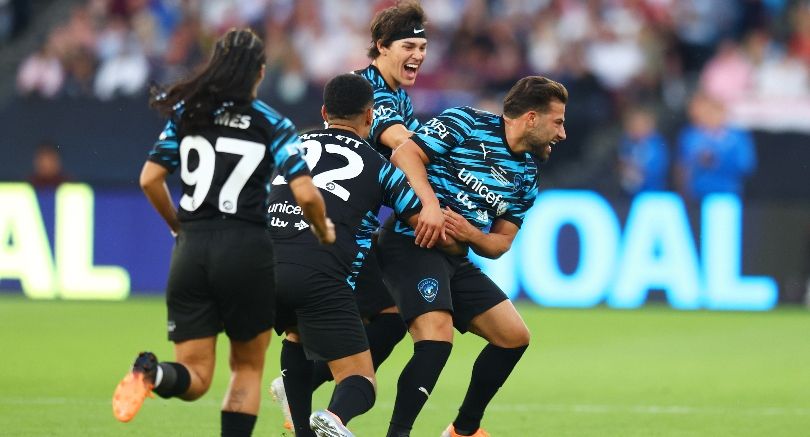 World XI players celebrate beating England at Soccer Aid 2022.